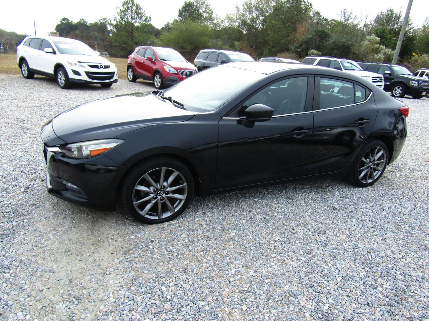 2018 Black /Black Mazda MAZDA3 s Touring AT 4-Door (3MZBN1V30JM) with an 2.5L L4 DOHC 16V engine, Automatic transmission, located at 15016 S Hwy 231, Midland City, AL, 36350, (334) 983-3001, 31.306210, -85.495277 - Photo#2